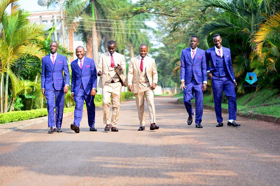 Groomsmen during a photo shoot by Lenz Media