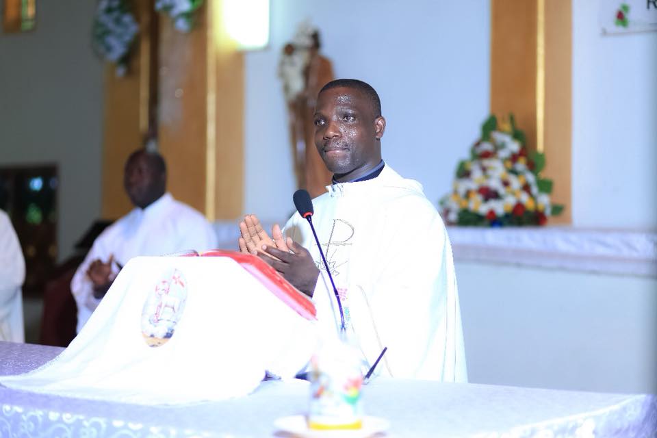 Father Deogratius Kiibi Kateregga presiding over Mark and Julian's wedding