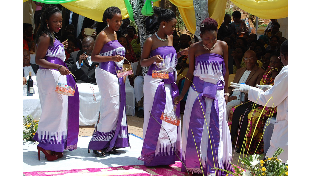 Ladies dazzle in the half gomesi inspired outfits, moments captured by Dream Occasions Ug