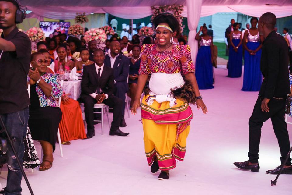 Flavia Namulindwa of The Dance N' Beats Cultural Troupe performs at wedding