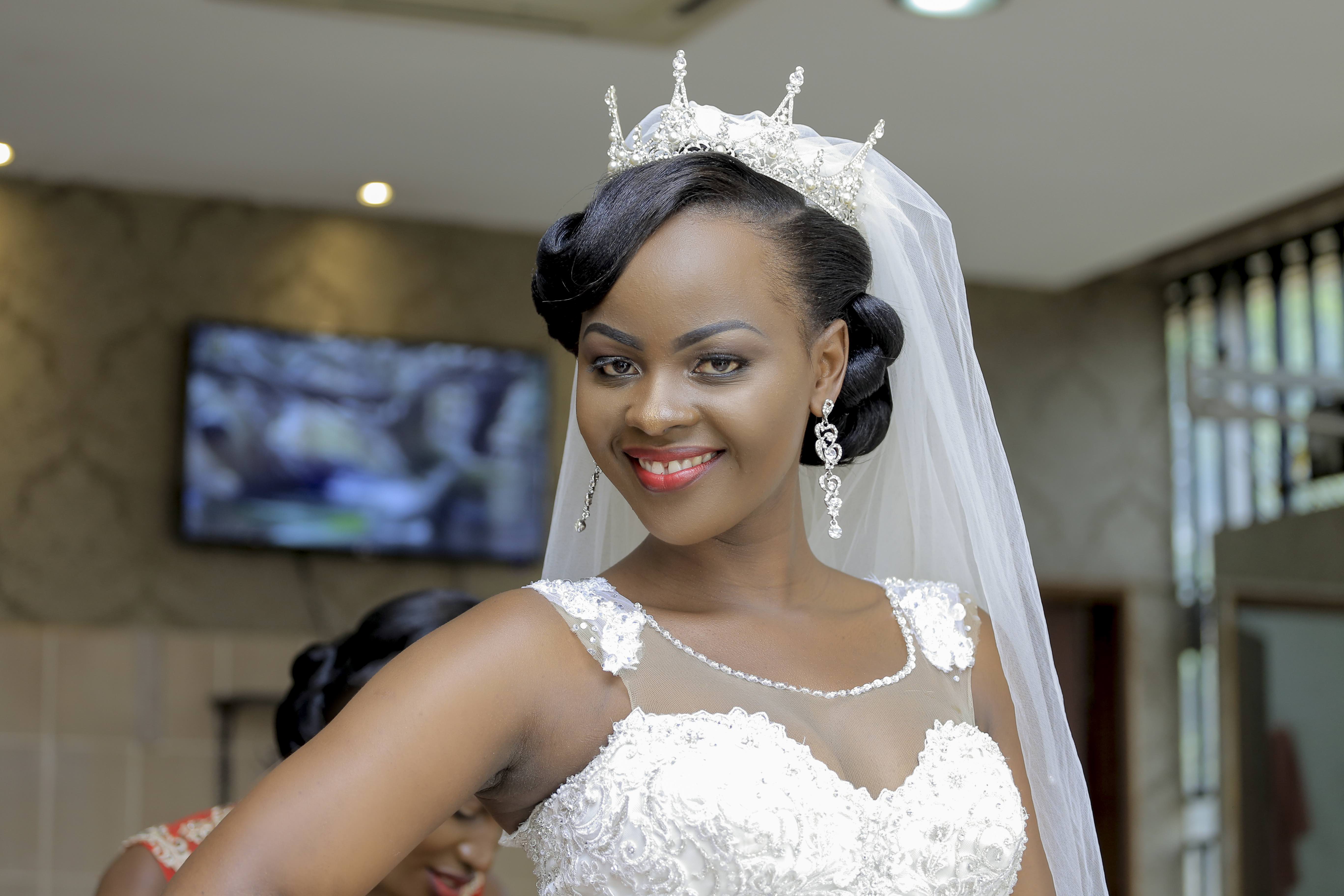 The dazzling Patience on her wedding day with Charles covered by Rossy Roots Photography