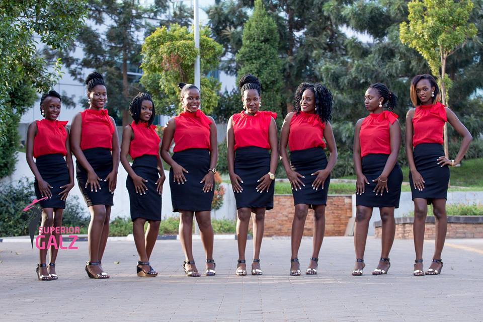 Beautiful ushers from Superior Galz Ushers cloaked in red and black outfits