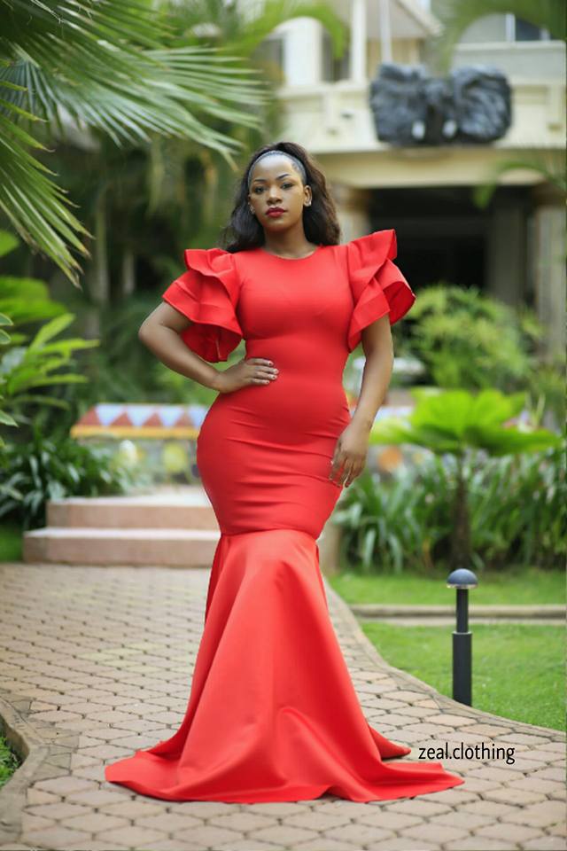 Fitting red gown designed by Zeal Clothing