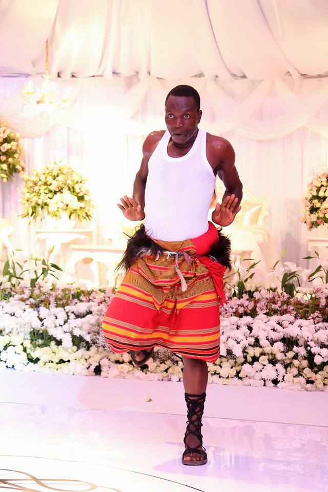 A member of The Dance N' Beats Cultural Troupe dances at wedding