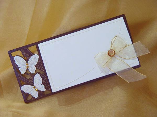 A butterfly inspired wedding card designed by Chic Designs