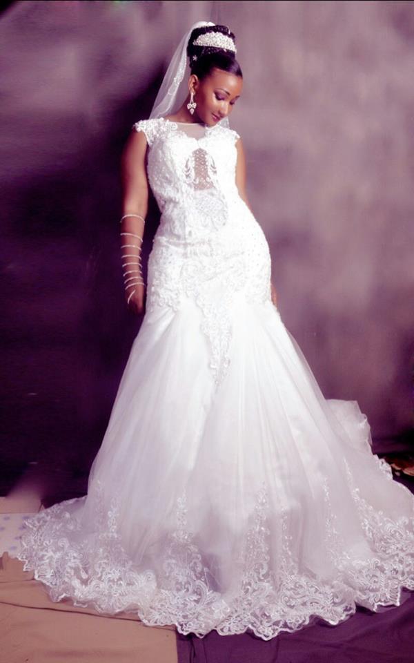 A model bride in a mermaid wedding dress by Aggie's Bridal