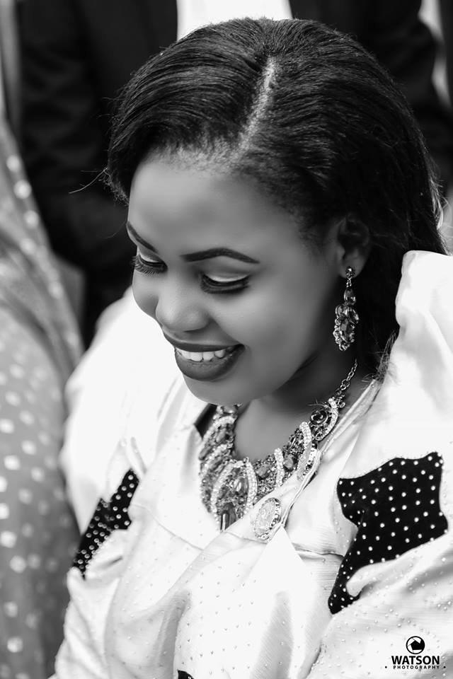 A Black & White photo of a bride at a customary wedding powered by Watson Photography