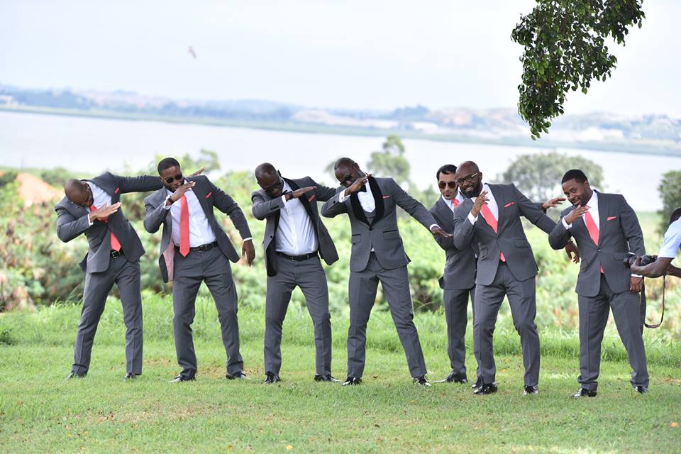 Groomsmen in grey suits at wedding photo shoot powered by Globetek Entertainment