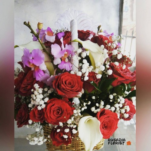 A special basket of gift flowers by Rusadia Florists and Decorations