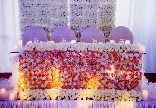 Wonderful high table decorations from Dr Charles Bate & Dr Martha's wedding by Catahena Decor