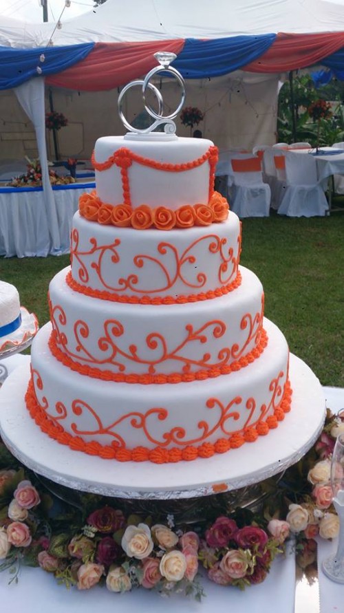 Beautifully designed wedding cake by Real Cakes Uganda