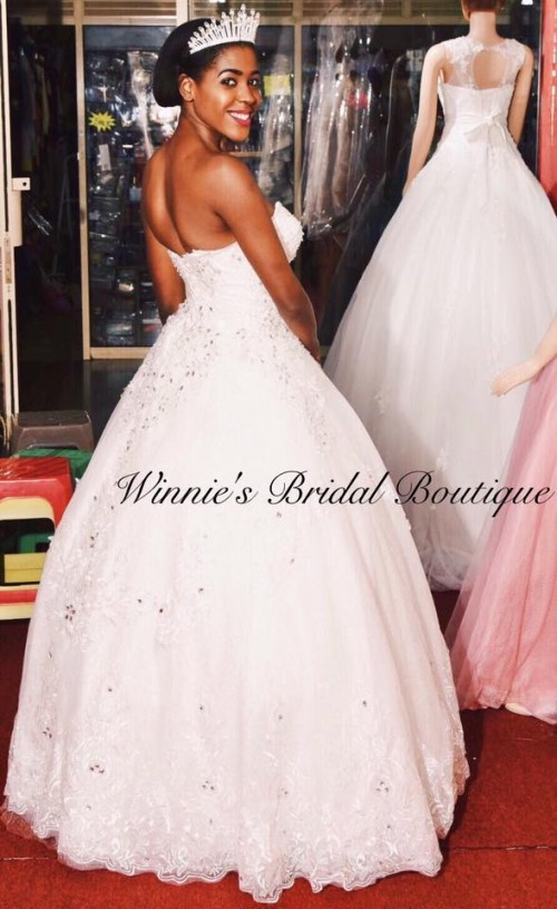 Check out our beautiful model, wearing one of our bandeau Cinderella wedding gowns.