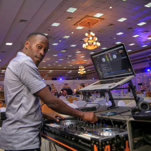 A deejay playing music at a wedding