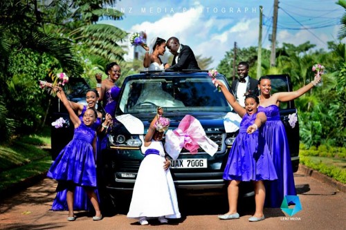 Bridal Entourage with bridesmaids in blue dresses captured by Lenz Media