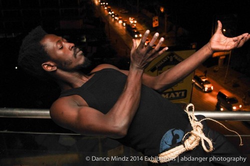 A guy dances at the Dance Mindz 2014 Exhibition in Kampala, Uganda
