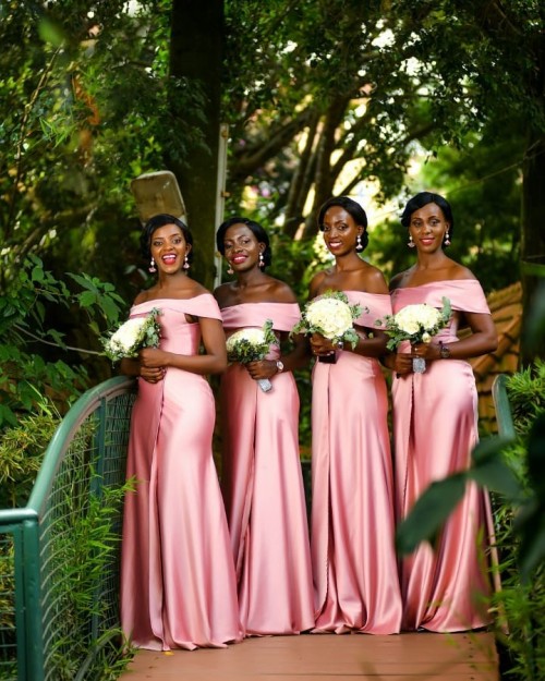 Bridesmaids cloaked in sleek off-should dresses, shots Devine Photography