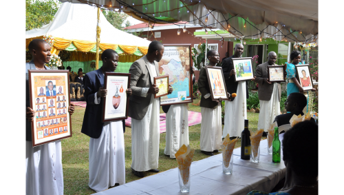 Guests present gifts to the family of the bride at a customary wedding captured by Dream Occasions Ug