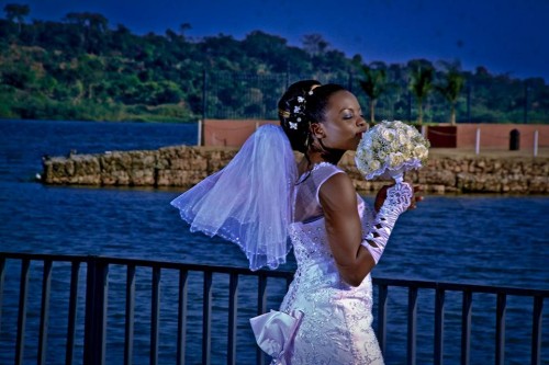A beautiful Ugandan bride at a wedding photo shoot at the Commonwealth Resort Munyonyo