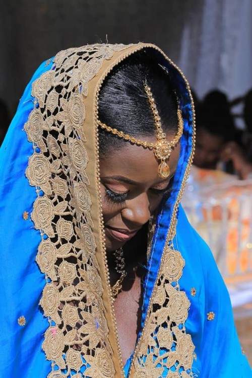 Kuhingira bride dressed by Peponi Clothing