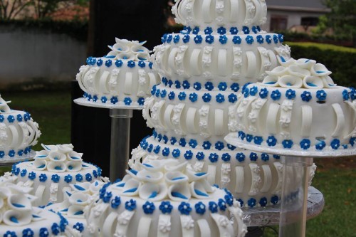 Beautiful white and blue wedding cake at Paya Gardens Nakulabye