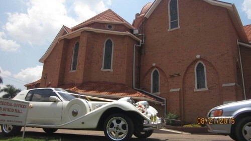 A vintage car from Wedding Car Hire Uganda at St. Paul's Cathedral Namirembe