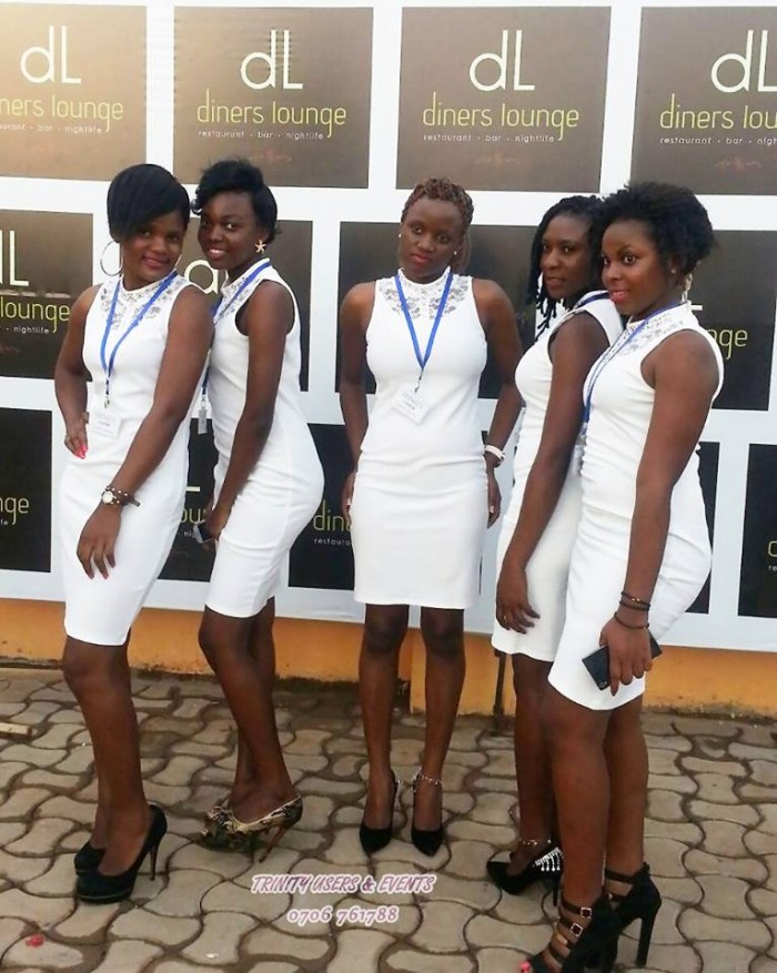 Girls from Trinity Ushers in white dresses