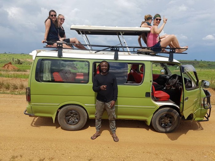Excited tourists during a tour in Uganda