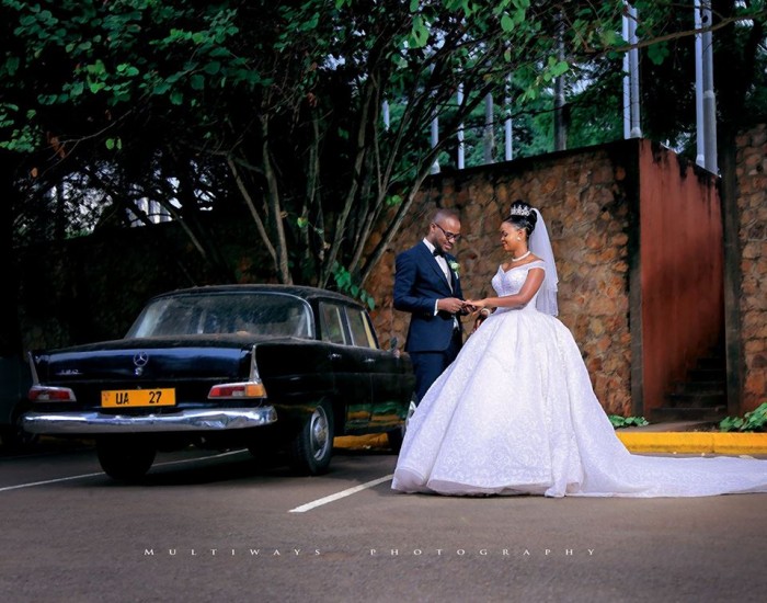A groom and his bride during a wedding photo shoot by MultiWays Photography