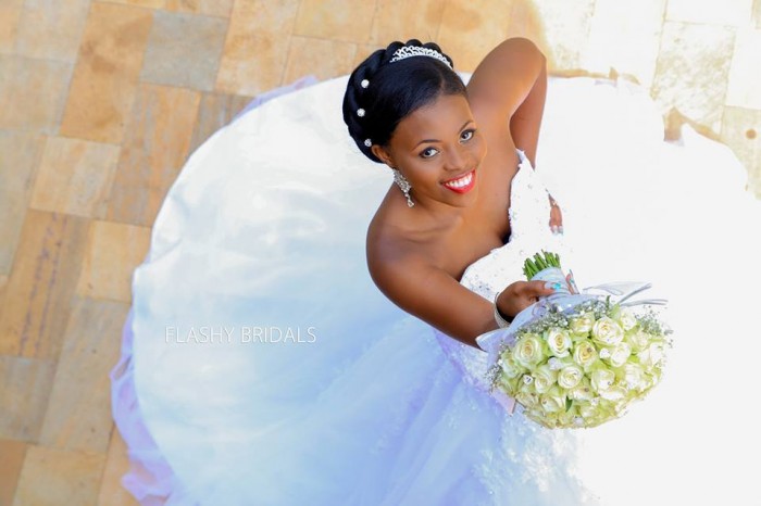 A bride in a strapless wedding dress by Flashy Bridals
