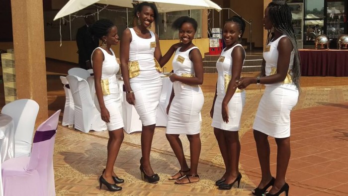 Ushers posing for a photo moment at Nican Resort in Sseguku, Entebbe