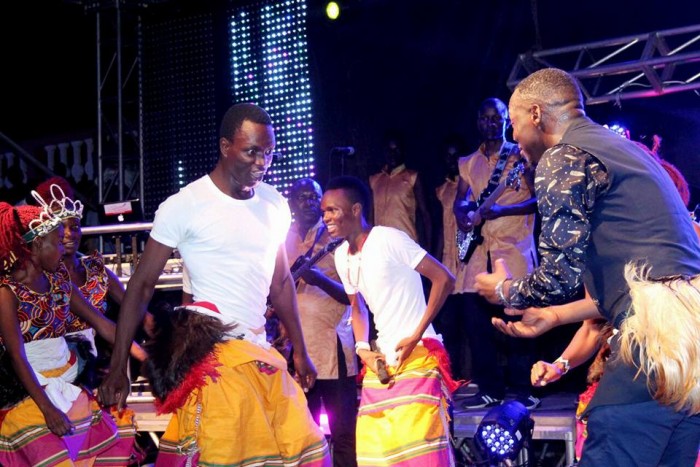 Meseach Ssemakula challenges The Dance N' Beats Cultural Troupe dancer at Hotel Africana
