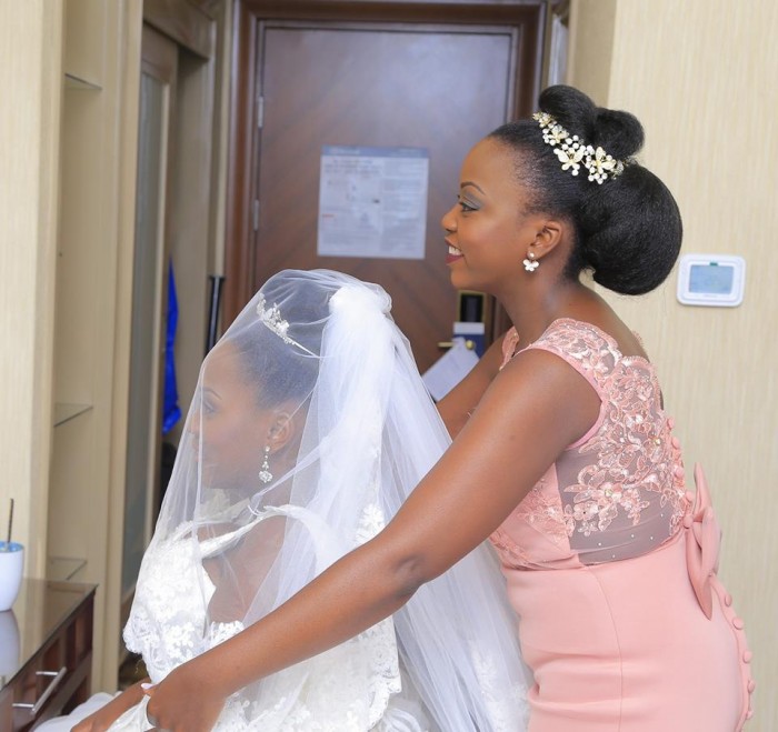 A bride and her maid of honor, shots powered Oscar Ntege Photography