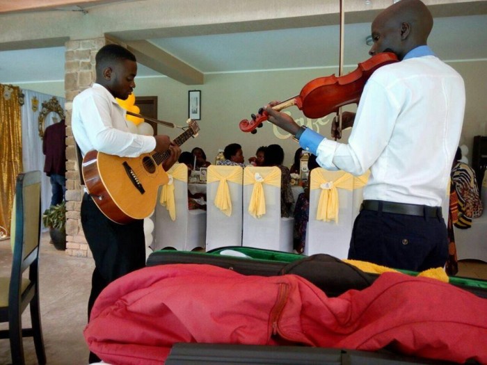 The Tabs Uganda performing at a small party in Kampala
