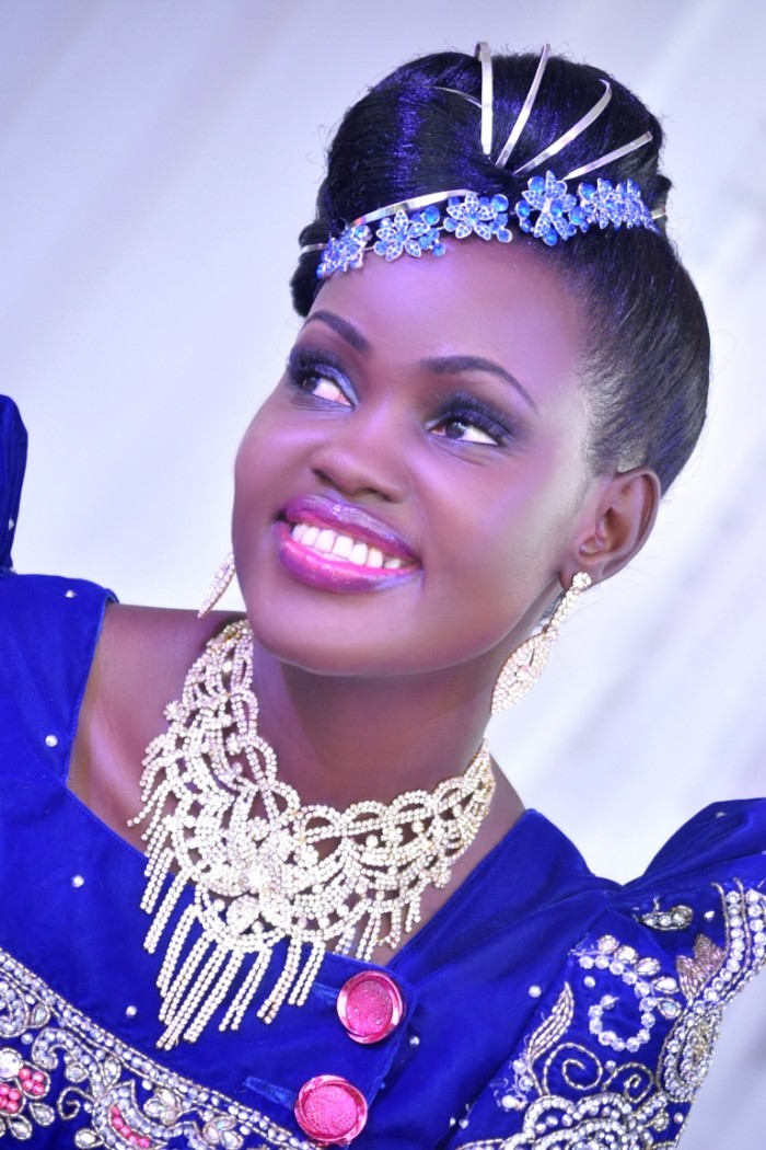 Rosette clad in a blue gomesi at her introduction