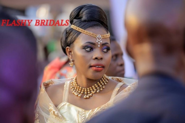 Barbara's Kwanjula Bridal Wear: Gold and Red Gomesi