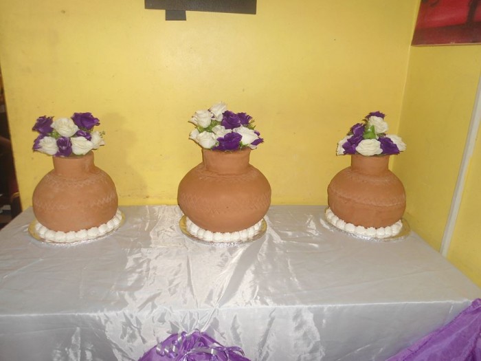 A flower pot inspired cake by New Day Bakery & Catering Services