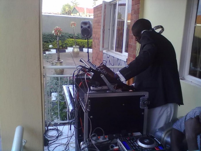 A deejay playing music at an event powered by Blaze Events