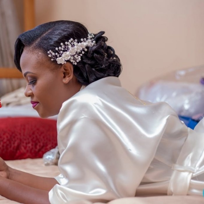 Neat bridal hairdo by Serene Beauty