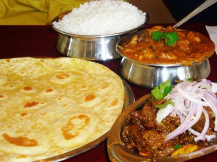 Chapatti, beef sauce and rice from Sunrise Catering Services Limited