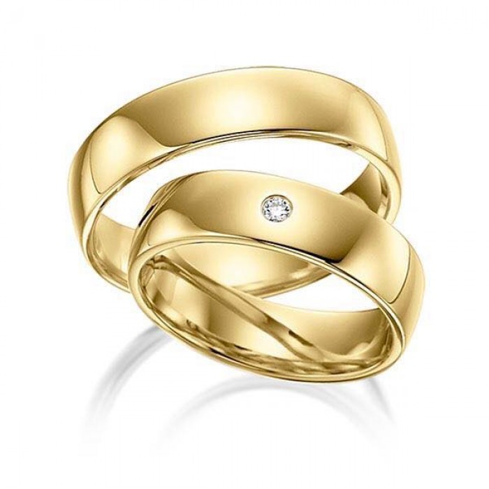 A gold pair of wedding rings from Ahmed Jeweller and Diamond Shop
