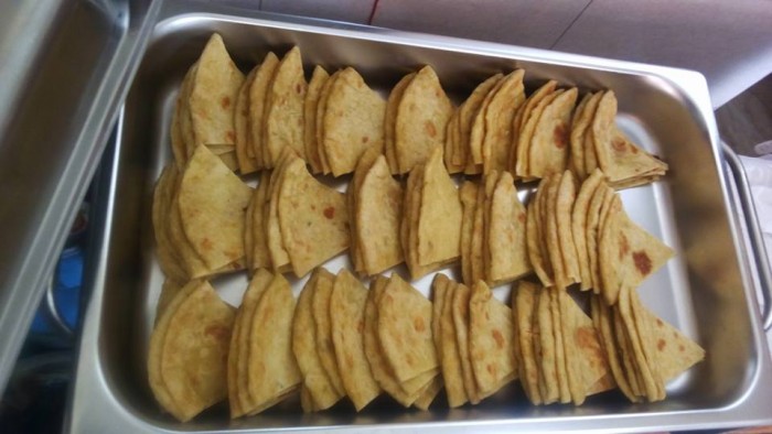Sliced chapati prepared by Tasty Planet Catering Services