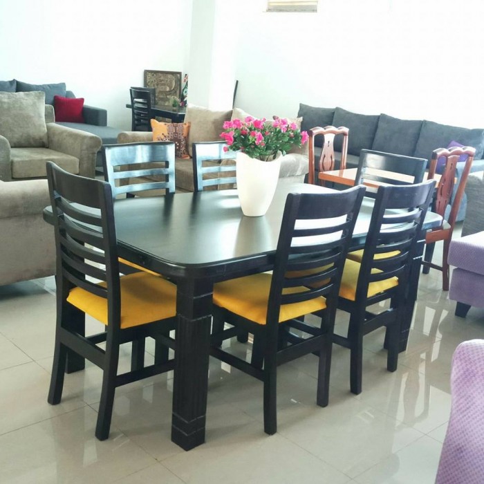 Nice black dining table made by The Furniture Workshop