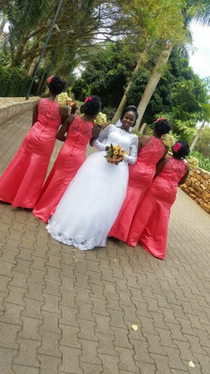 A bride and her maids dressed by Destiny bridals boutique