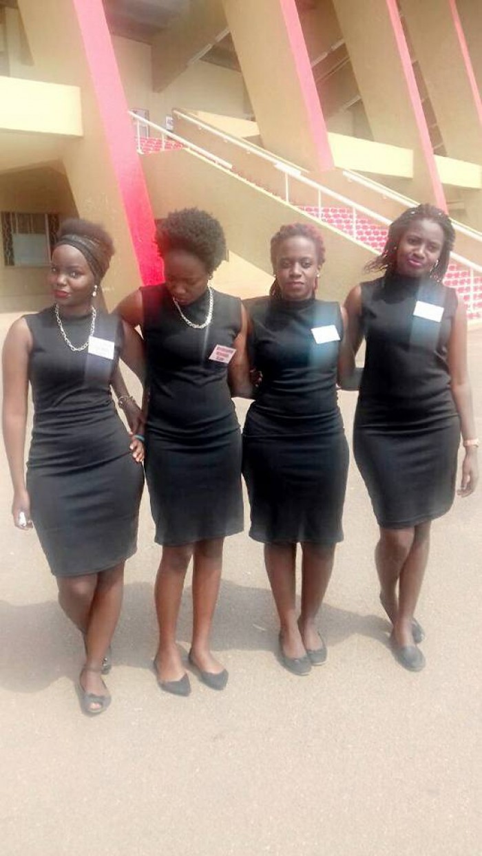 Four members of the Derfynation Ushering Team in black dresses at Namboole Stadium