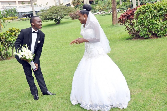 A bride and groom at a wedding photo shoot by Capital Studio Uganda