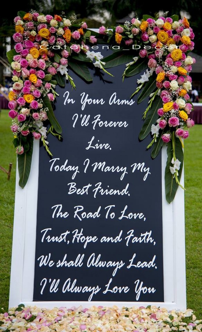 A wonder placard message for Dr Michael & Dr Millie Nalule's wedding