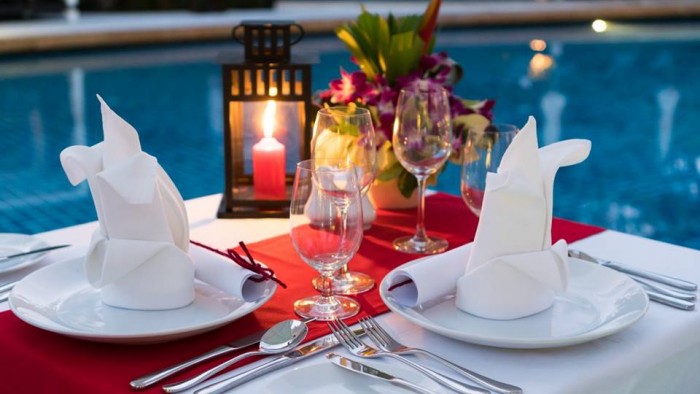 Get the perfect ambiance at Royal Suites' pool side venue