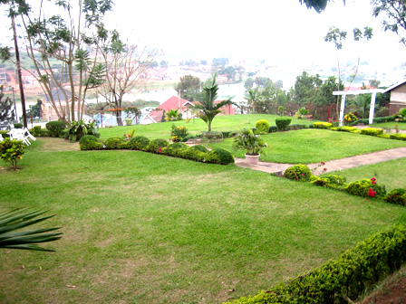 Spacious green gardens at Tal Cottages