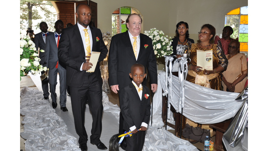 Groomsmen walk into church for a wedding ceremony