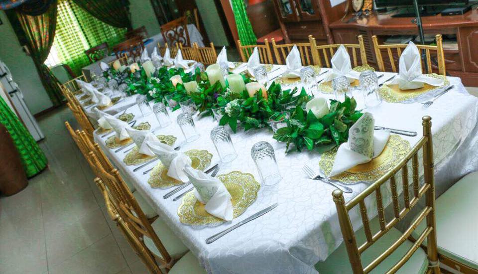 Gold, white and green inspired decorations by Lega Events
